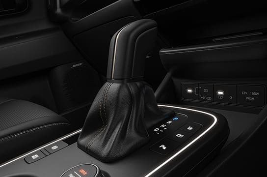 Leather^ gear shift knob (Black with brass inserts)